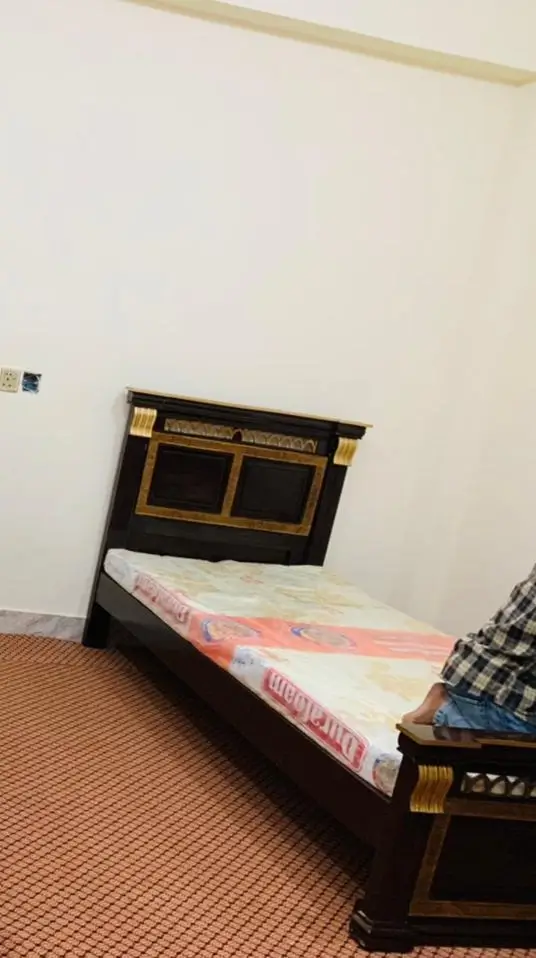 Simple wooden single bed - Image 1